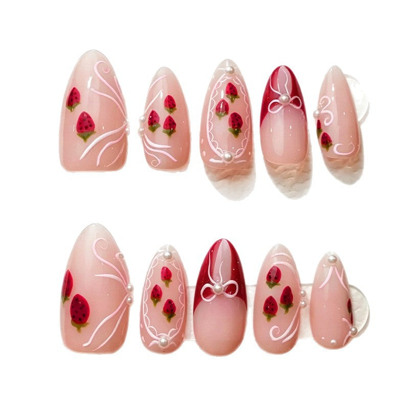 Artificial nail set with romantic strawberry and bow motifs Stornfield