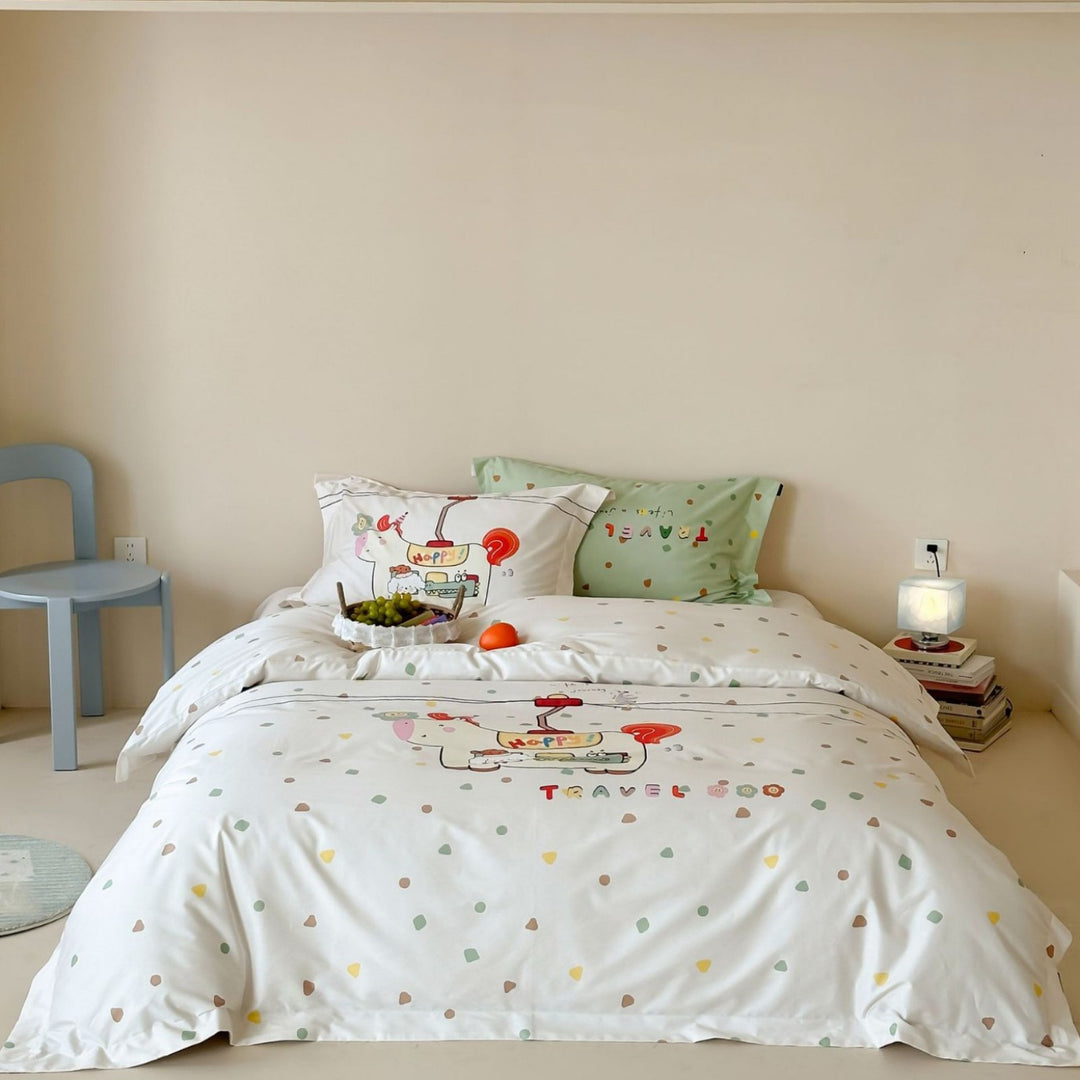 Bedding set for children made of cotton satin with contrasting piping and puppy print