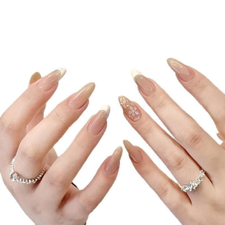 Artificial nails with sweet animal motifs and elegant French tip design Stornfield