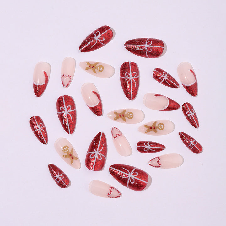 Artificial nail set with festive candy cane and gingerbread pattern Stornfield