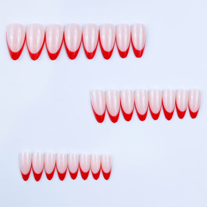 Artificial nails in stylish stiletto design with eye-catching top coat Stornfield