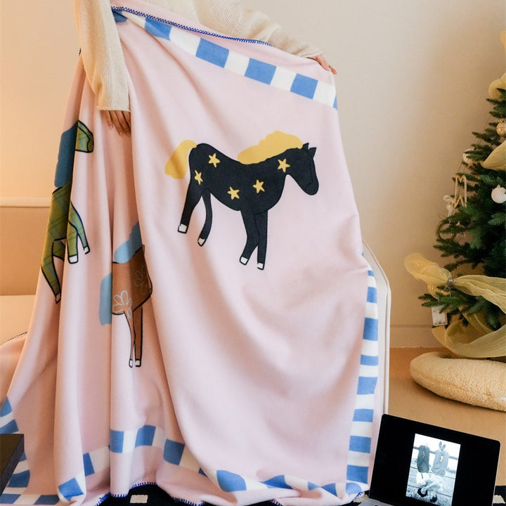 Children's cuddly blanket made of soft fleece with horse print and decorative edge