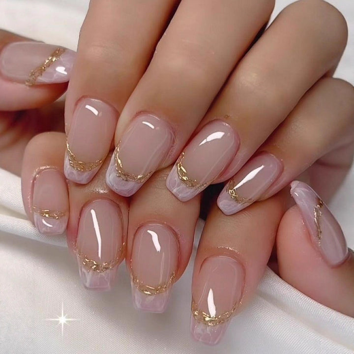 Elegant Artificial Nails with French Manicure and Glitter Effects Stornfield
