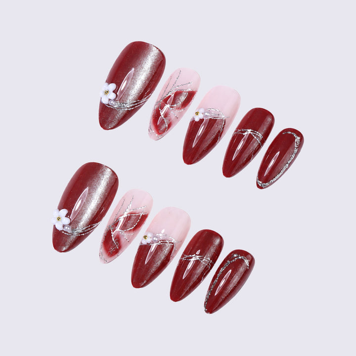 Decorative Press-On Nail Art with Floral Accents Stornfield