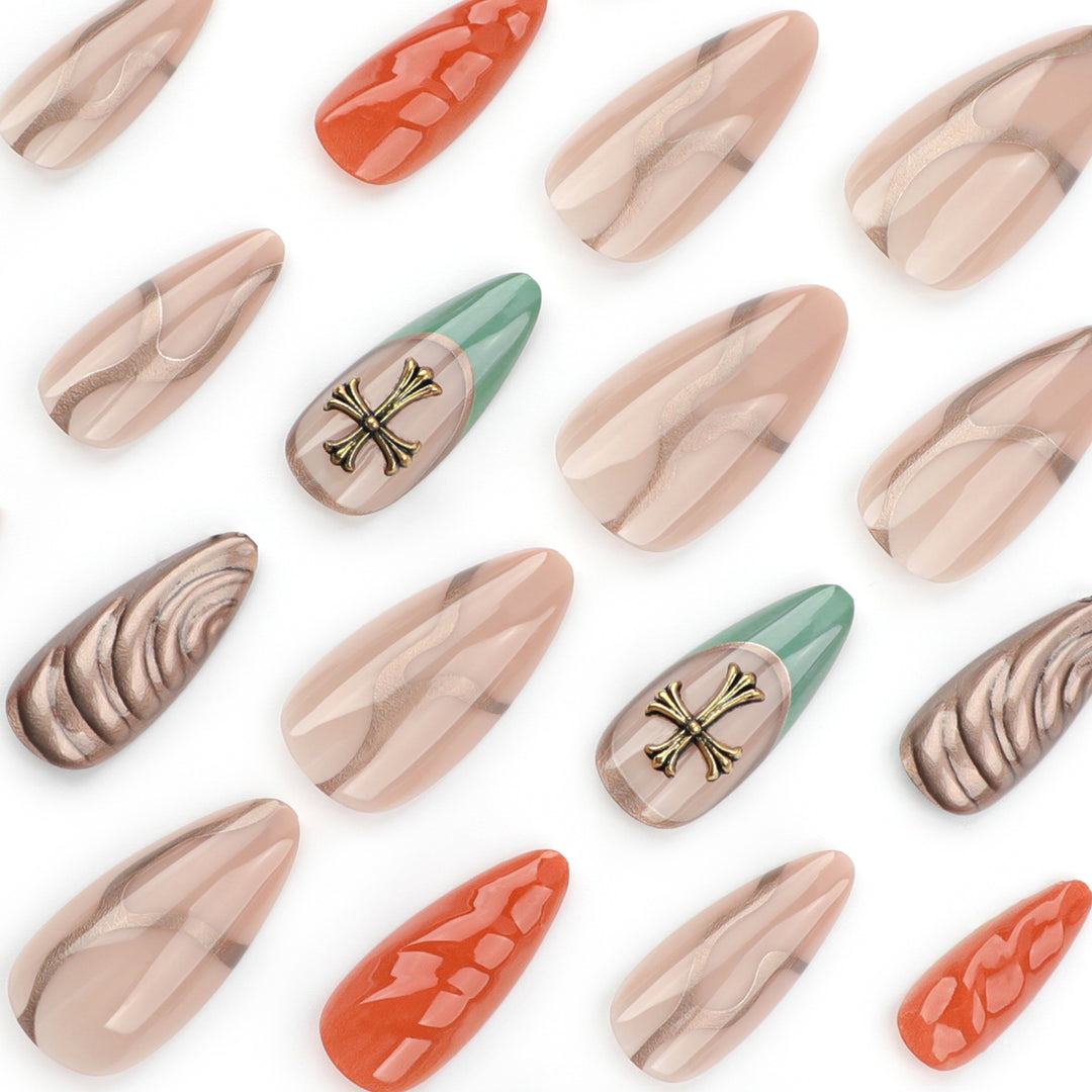 Artful stiletto nails with glitter and motif decorations Stornfield