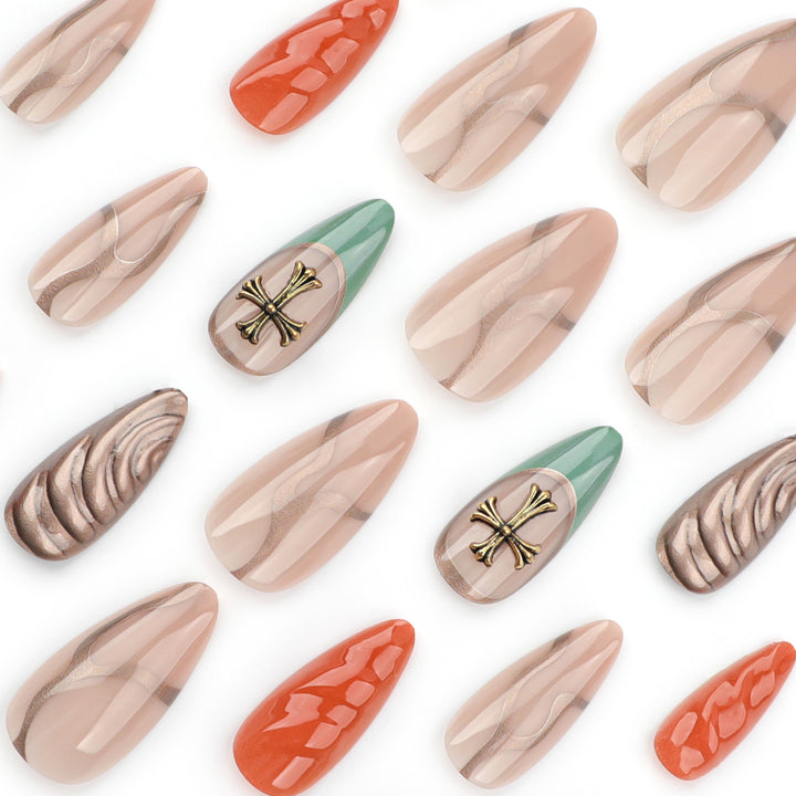 Artful stiletto nails with glitter and motif decorations Stornfield