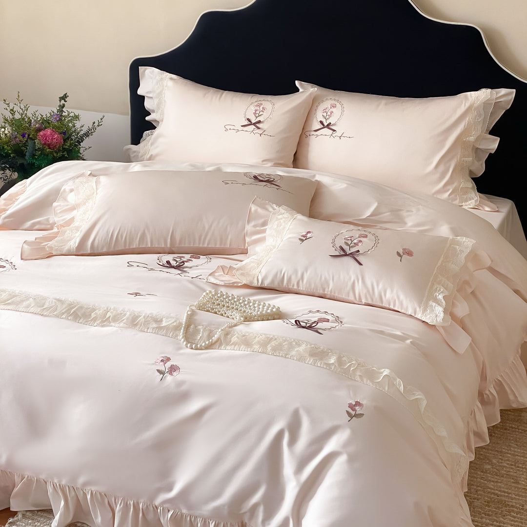Bedding set made of cotton satin with frill ruffle, delicate flower embroidery and pillowcases