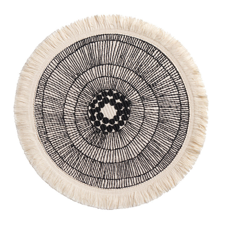 Round woven Boho rug mat with decorative fringes Stornfield