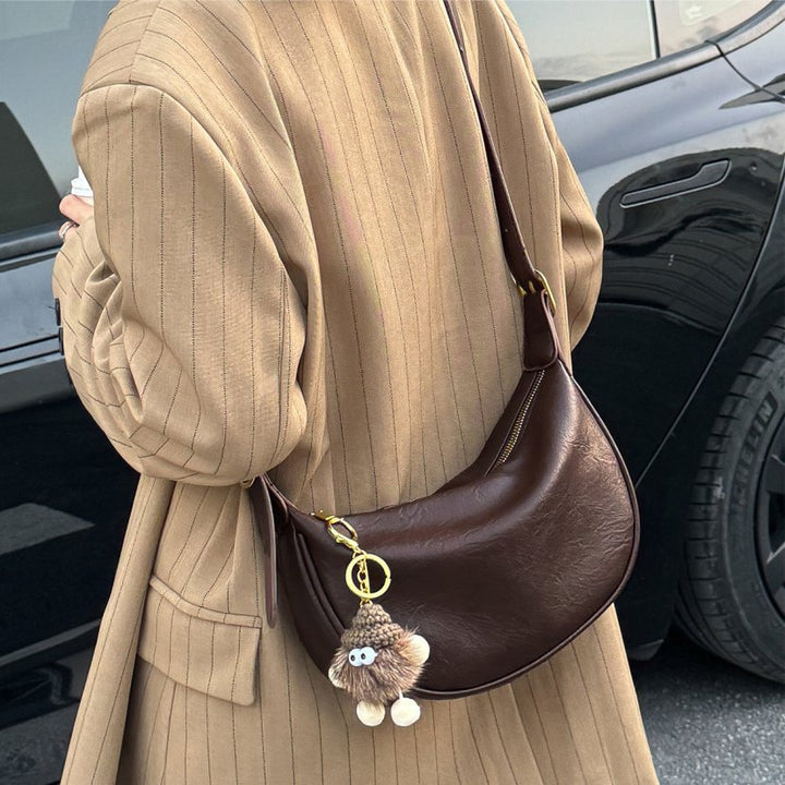 Sleek Crescent Shaped Crossbody Bag Stornfield