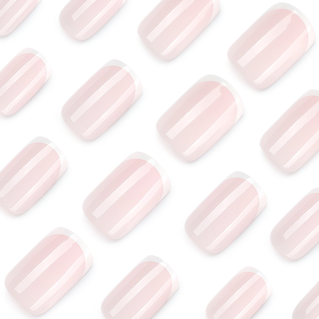 Classic nail extensions with elegant French tips Stornfield