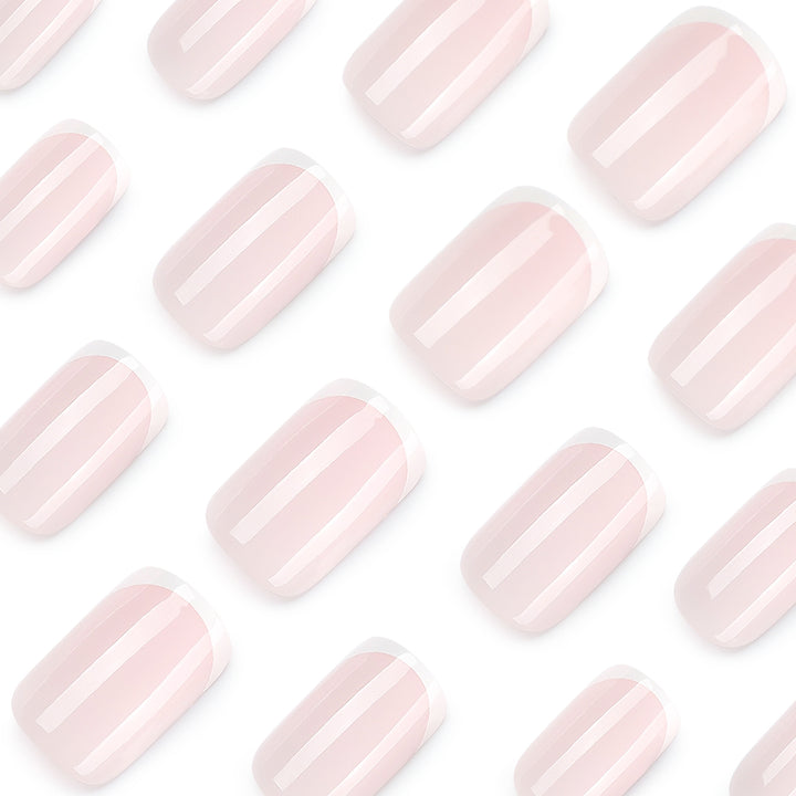 Classic nail extensions with elegant French tips Stornfield