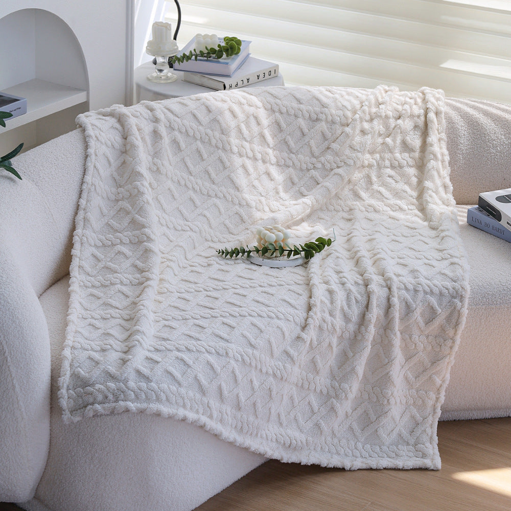 Cuddle blanket with textured surface