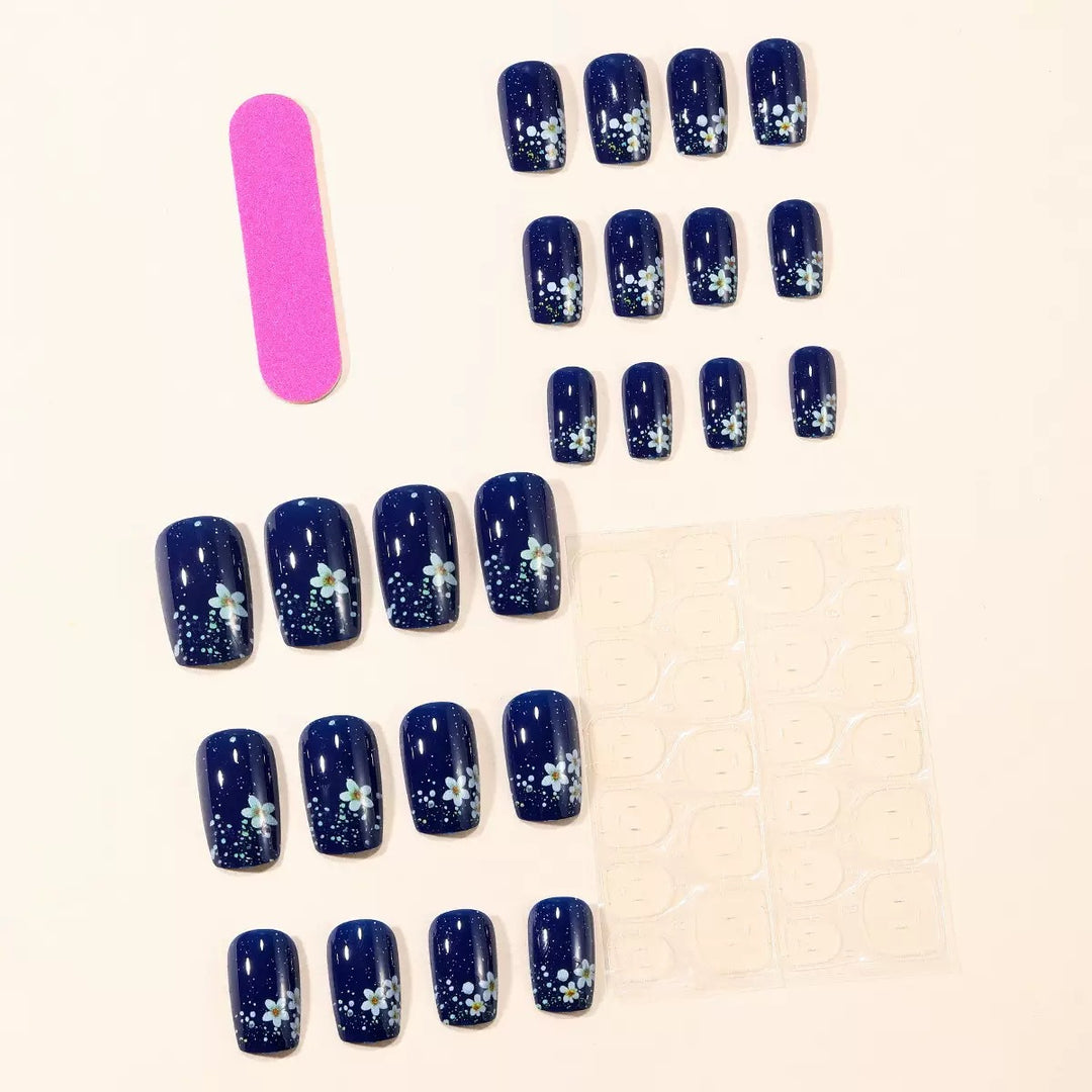 Acrylic nail set with elegant flower design and glitter accents Stornfield