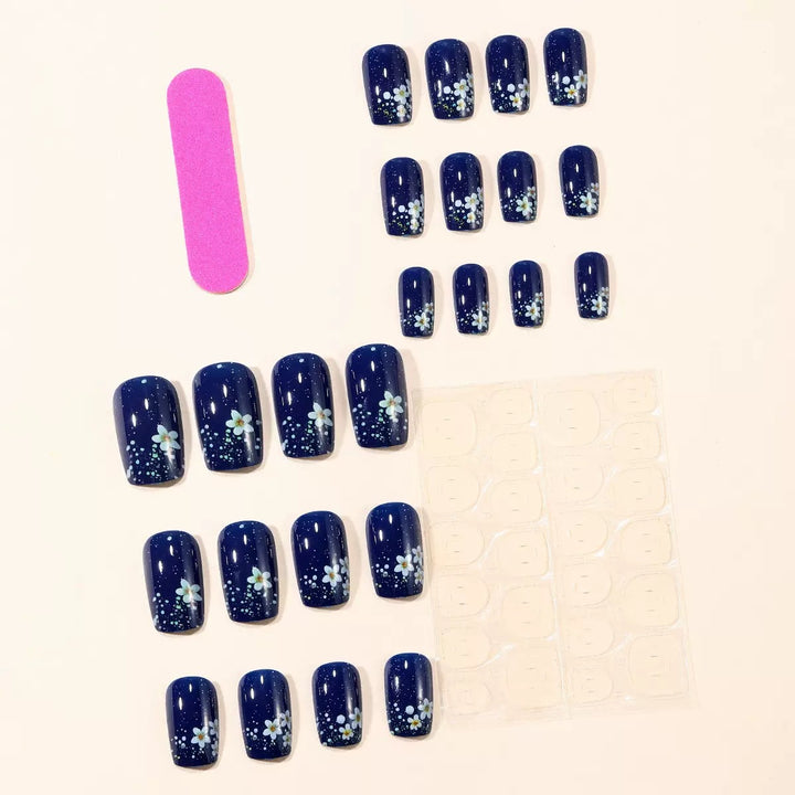 Acrylic nail set with elegant flower design and glitter accents Stornfield