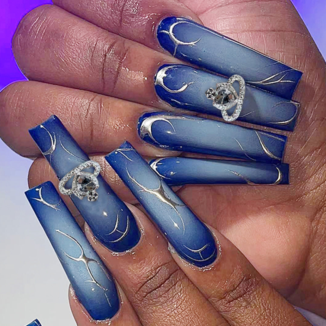 Creative artificial nails with ombre effect and glitter Stornfield