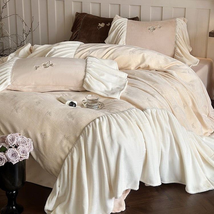Satin bedding set with gathered ruffles and delicate butterfly embroidery