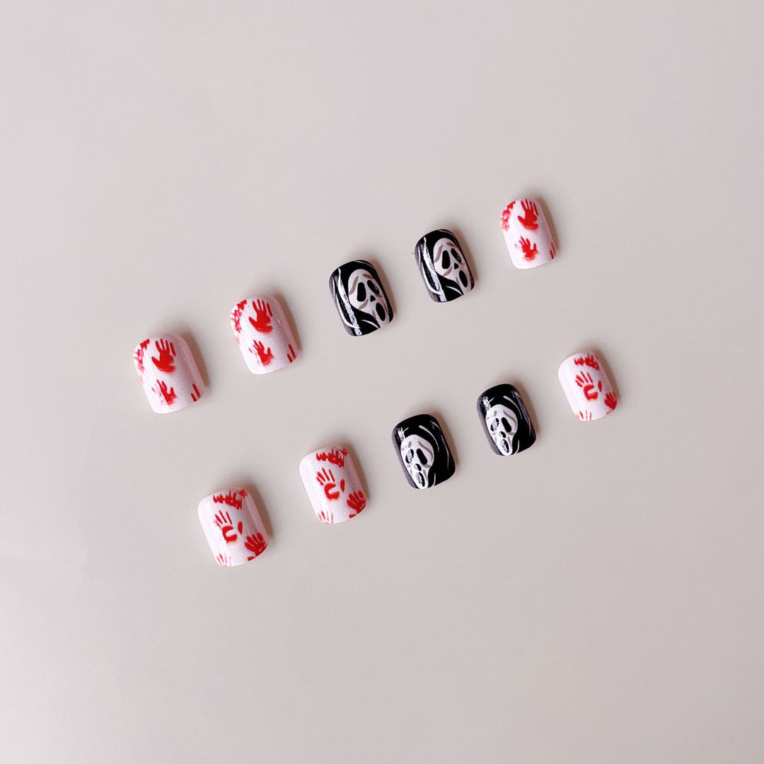 Creative Halloween Nail Art Set with Creepy Designs and Sparkling Accents Stornfield
