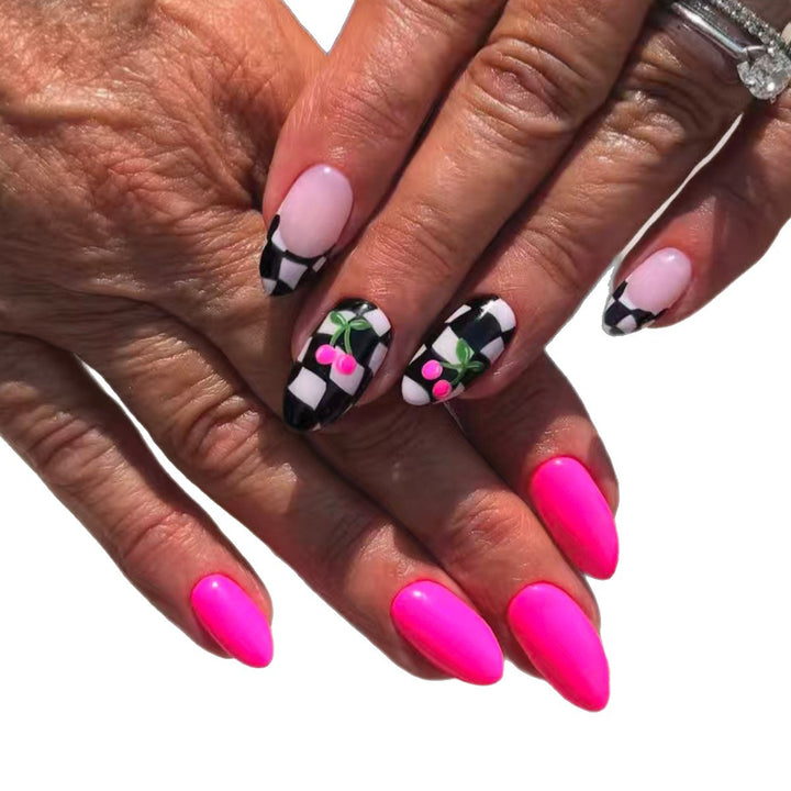 Creative artificial nails with playful cherry and checkerboard design Stornfield