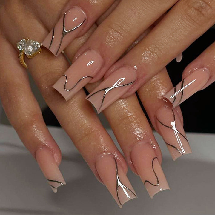 Artificial nail set with elegant 3D designs and high-gloss accents Stornfield