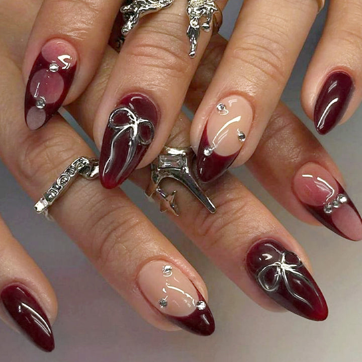 Creative nail art set with elaborate two-tone effect and elegant embellishments Stornfield