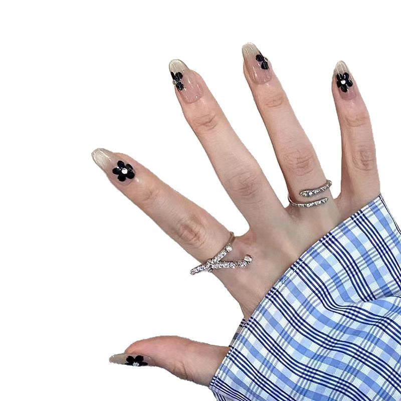 Artificial nails with elegant floral decorations Stornfield
