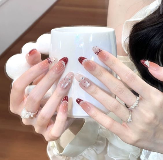 Artificial nails with elegant glitter accents Stornfield