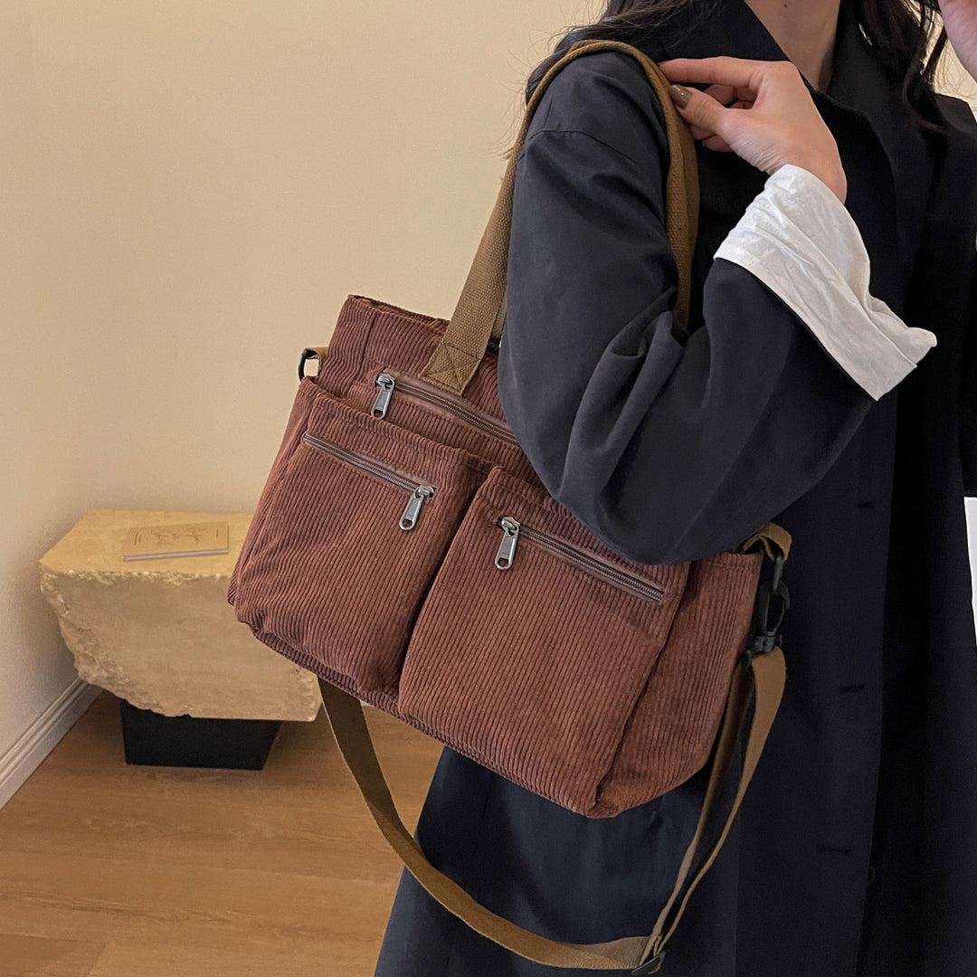 Durable shoulder bag with multiple compartments Stornfield