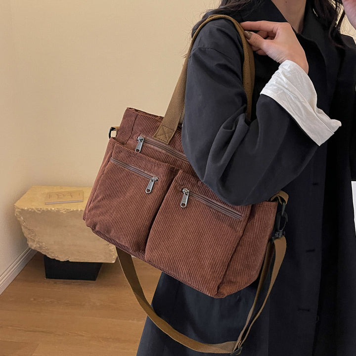 Durable shoulder bag with multiple compartments Stornfield