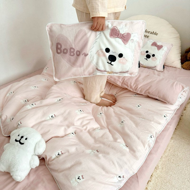Children's bedding set in futon style with embroidered puppy motifs and cuddle pillow