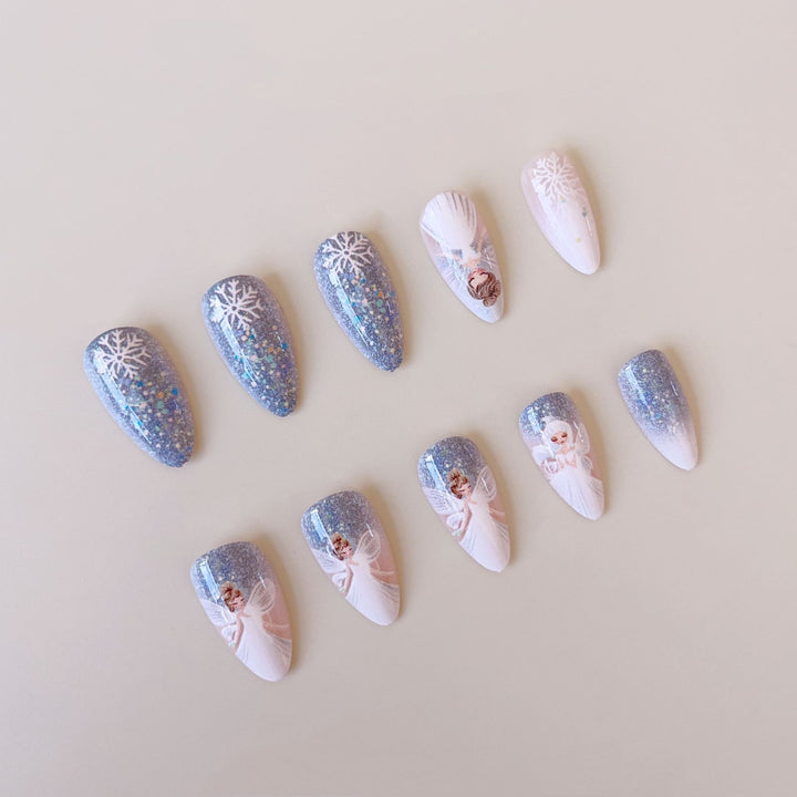 Nail art set with enchanting fairy motifs and glitter accents Stornfield