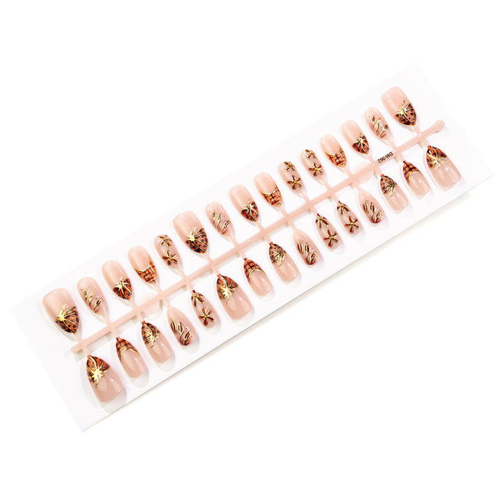 Decorative Press-On Nail Art Set with Elegant Floral and Gold Accents Stornfield