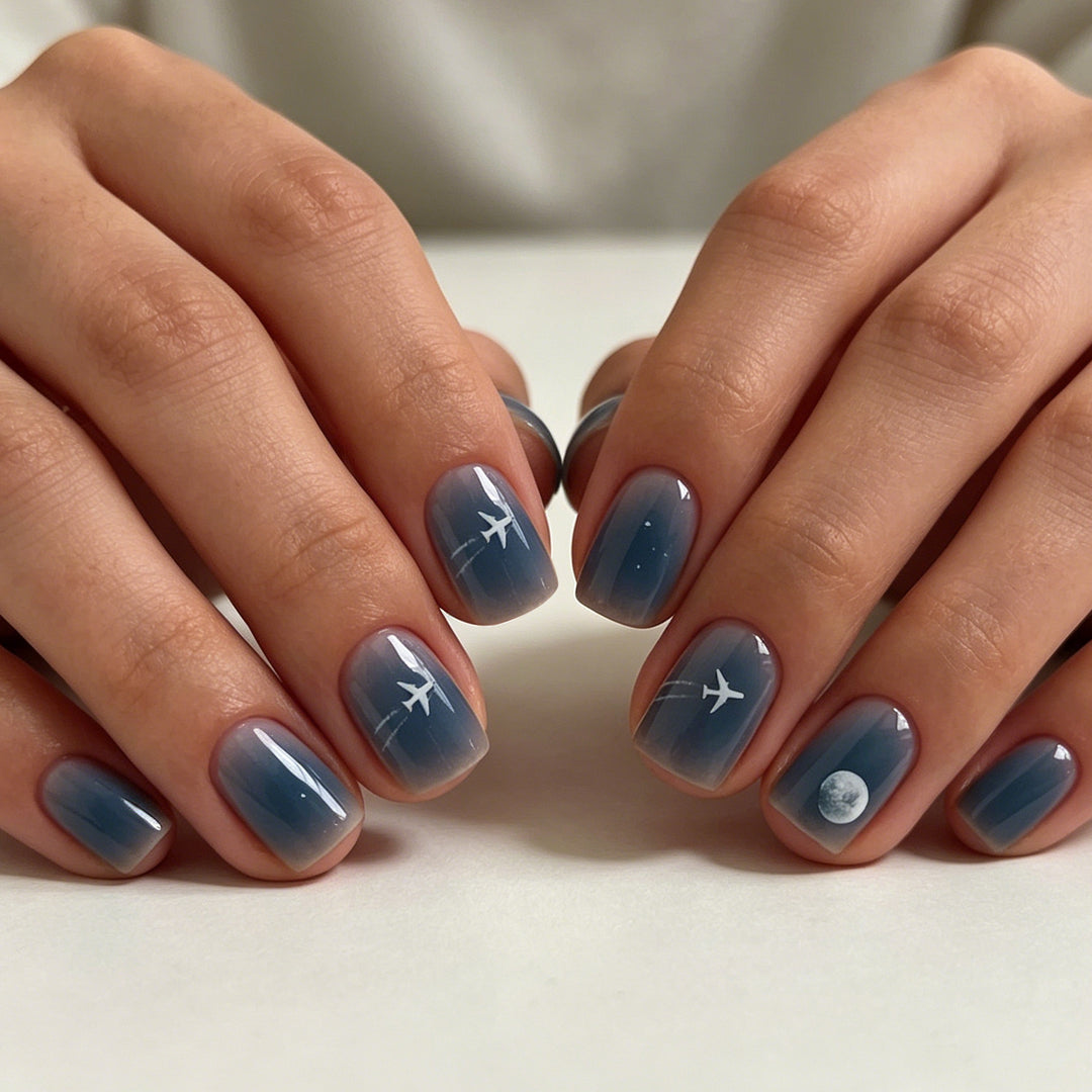 Artistic Travel-Themed Nail Art Stornfield