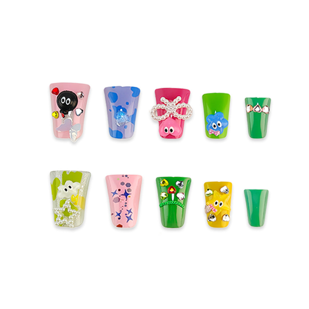 Creative press-on nails with playful 3D designs Stornfield