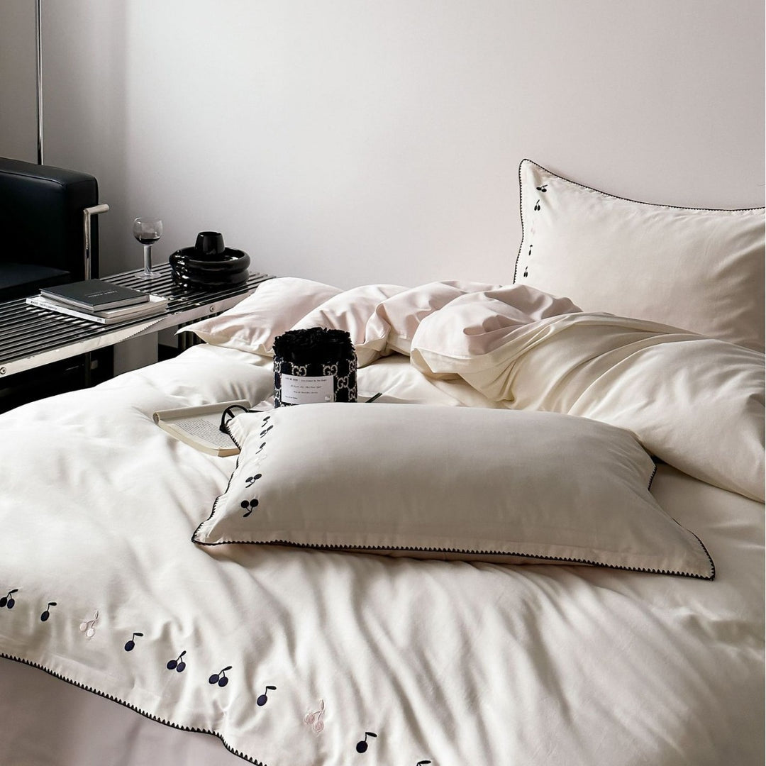 Luxurious cotton satin bedding set with subtly embroidered cherries