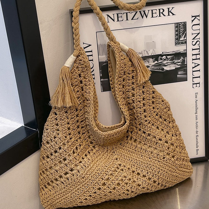 Hand-knotted shoulder bag with tassels and spacious interior Stornfield