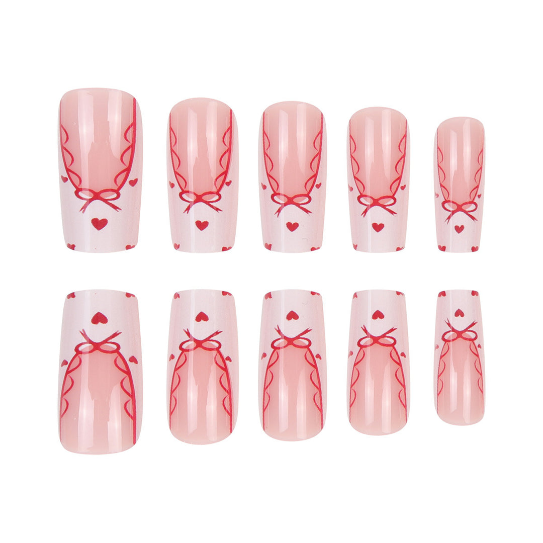Decorative Long Press-On Nail Set with Bow and Heart Design Stornfield