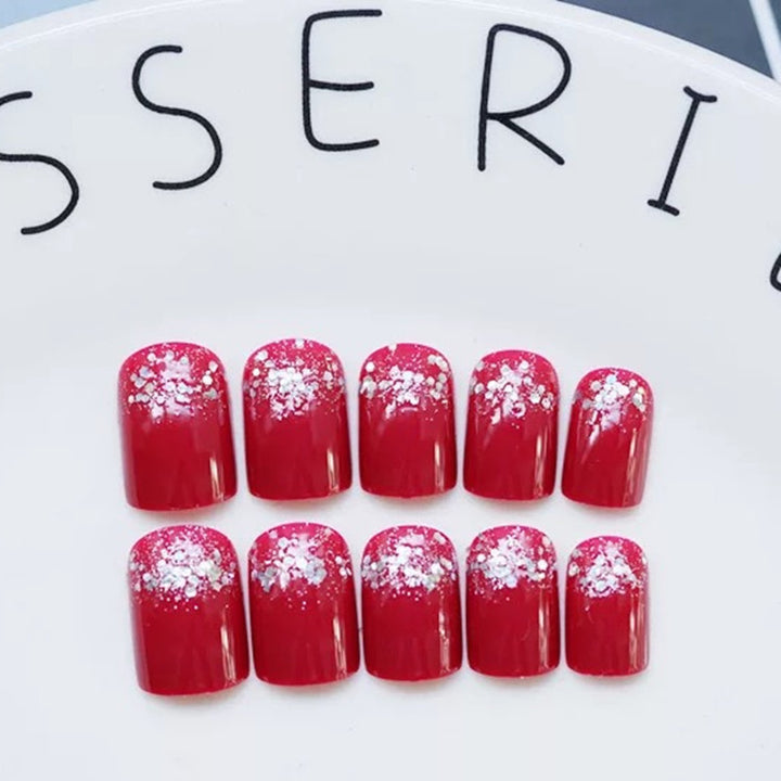 Glamorous artificial nails with glitter accents Stornfield