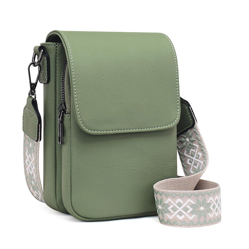 Small crossbody bag with decorative shoulder strap Stornfield