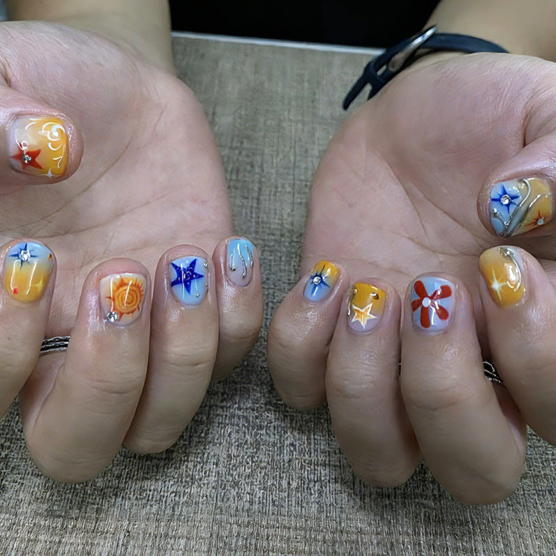 Acrylic nail set with creative floral and geometric design Stornfield