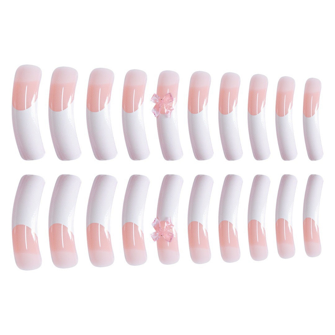 Elegant Nail Art Enhancements with Decorative Bow Accents Stornfield