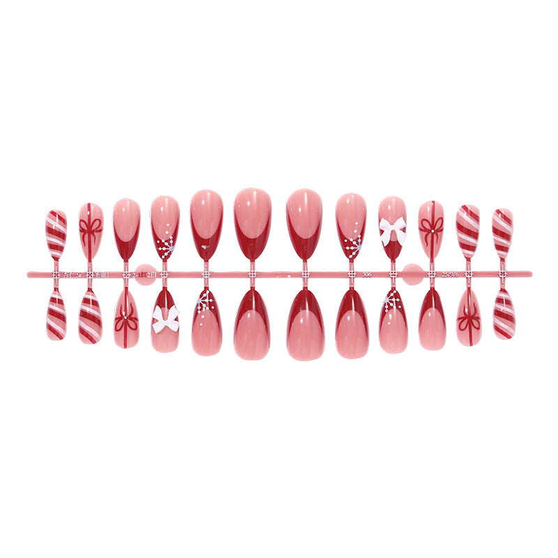 Decorative Press-On Nail Set with Elegant Bow and Striped Designs Stornfield