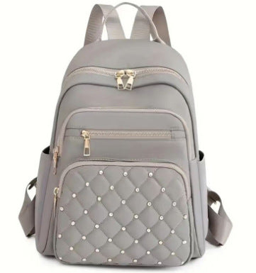 Women's Quilted Backpack with Decorative Studs Stornfield