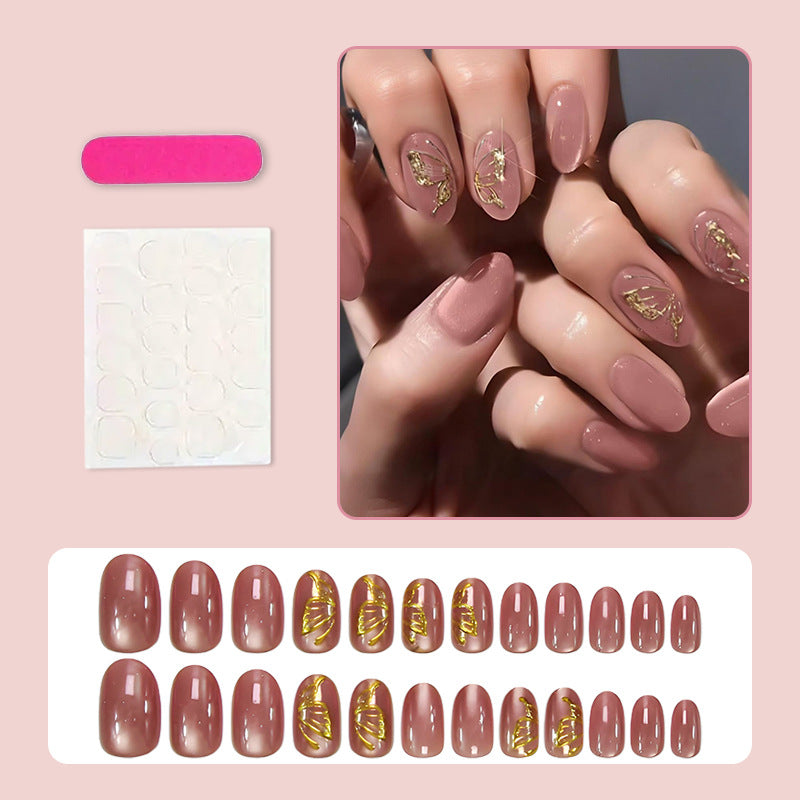 Acrylic nail set with elegant golden accents and shimmering finish Stornfield