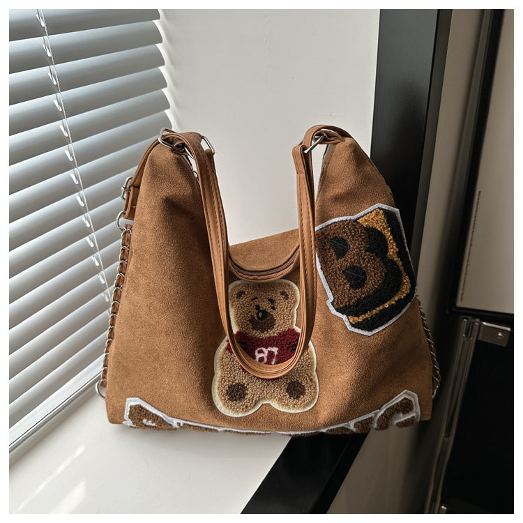Shoulder bag in playful bear pattern Stornfield