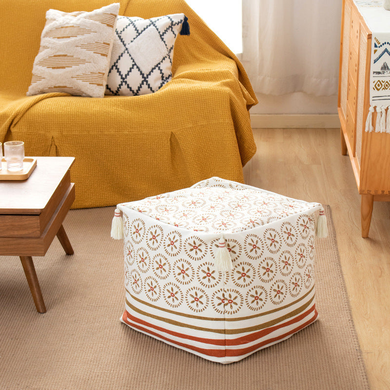 Square pouf seat cube made of cotton blend fabric with boho embroidery and tassels