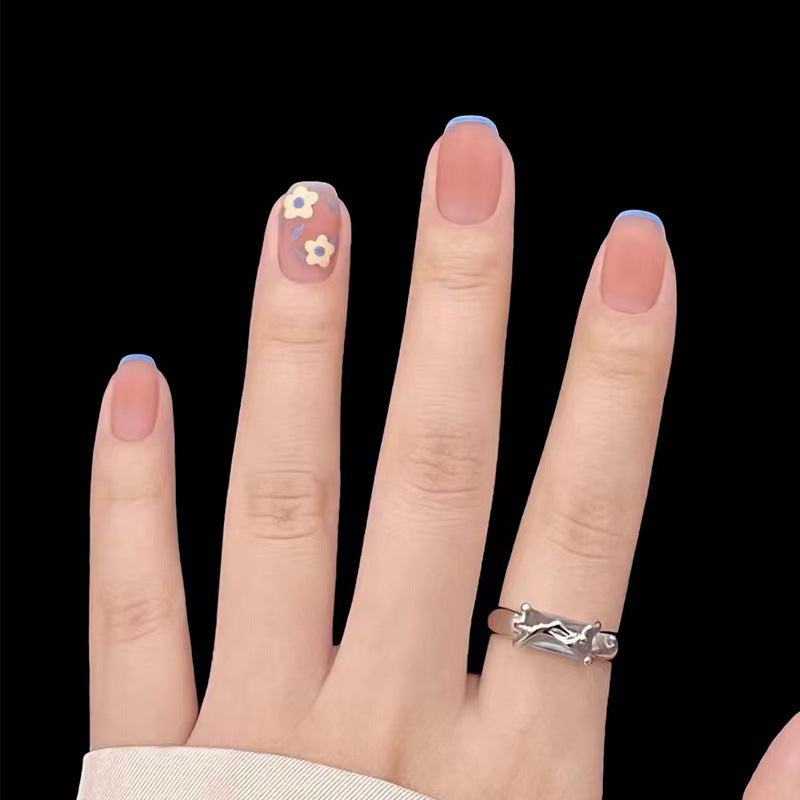 Creative nail design with floral accents Stornfield