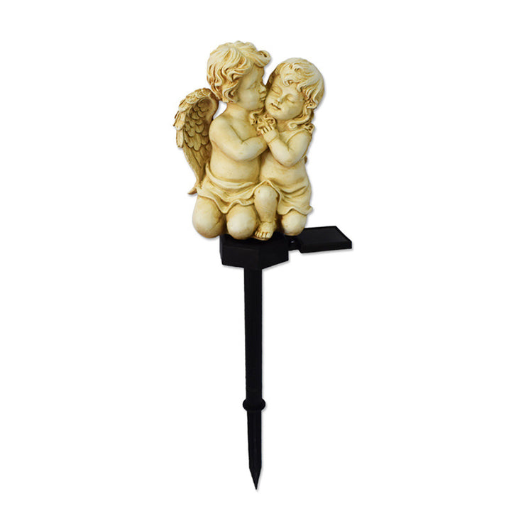 Decorative Solar Garden Stake Statue Resin Girl Figurine With Integrated Solar LED And Weatherproof Spike Stornfield