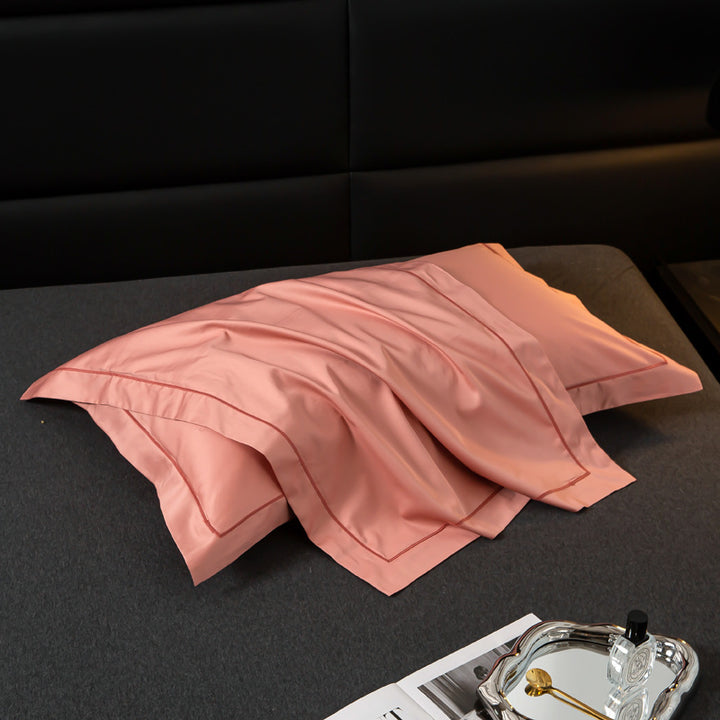 Luxurious satin cushion cover with decorative double piping