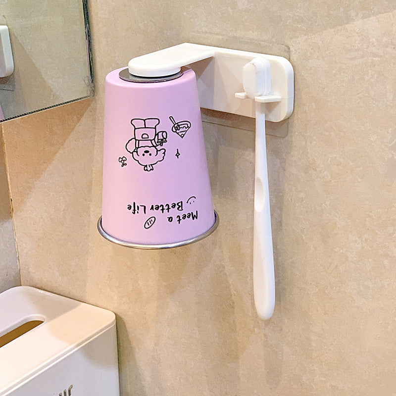 Wall-mounted toothbrush holder with playful design Stornfield