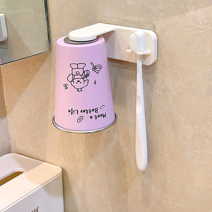 Wall-mounted toothbrush holder with playful design Stornfield
